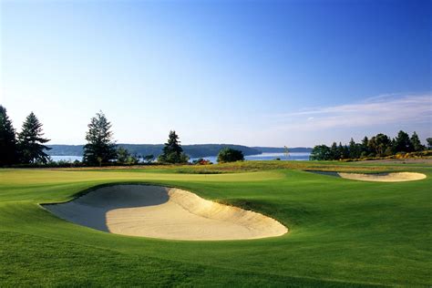 The home course - Historical Feature – Bordering the right side of the fairway are several apple trees that were planted during the 1830’s by Hudson’s Bay settlers. To the left of the green, within the black fencing, rests the remnants of the original Fort Nisqually. On the hillside right of the green is a Native-American and old settler burial ground. 